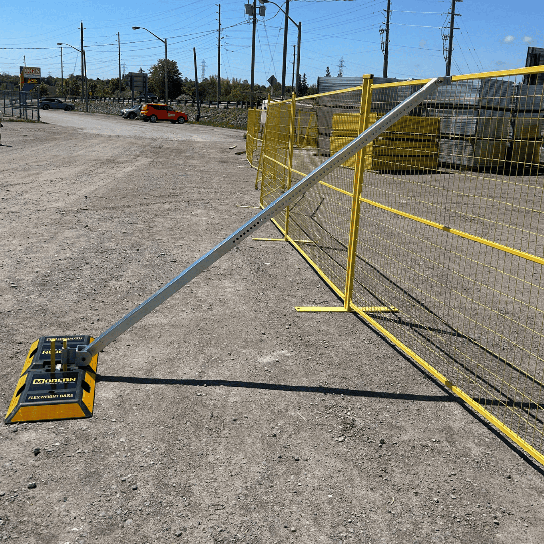 wind brace supporting a temporary fence panel