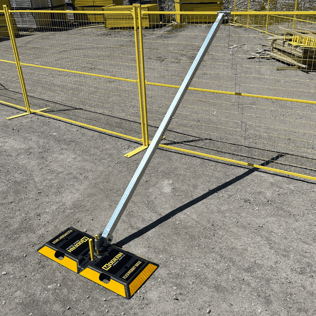 wind brace supporting a temporary fence panel